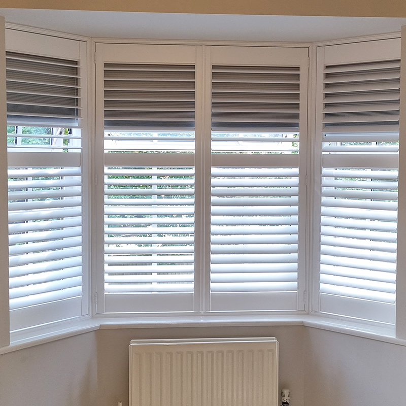 bay window shutters with blackout blind
